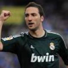 arsenal bid for real madrid star gonzalo higuain as juventus turn their attention to carlos tevez