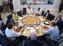 Barack Obama and Vladimir Putin. Did two chaps ever look less thrilled to see one another?