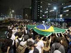 More than 200,000 protesters take to the streets of Brazil to protest the billions spent on hosting the 2014 World Cup